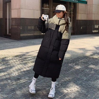 Veste matelassée mi-longue à empiècements contrastés – Coupe ample et style moderne